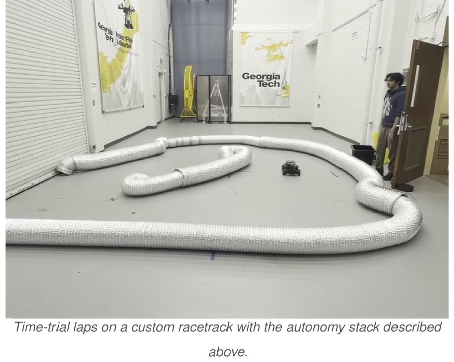 1/10-scale racecar completing time-trial laps on a custom track